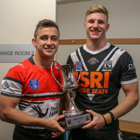 Image: Wests win the Jason Taylor Cup. Respective captains Billy Brittain & Luke Garner pose with the trophy - Campbelltown Stadium. Photo Steve Little.